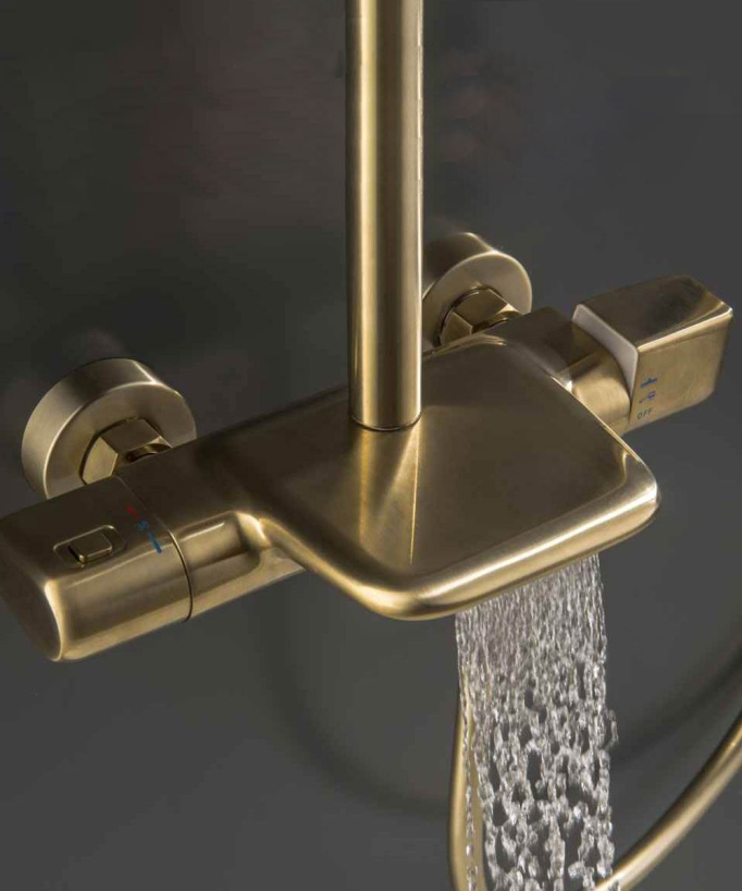 Colonne de douche thermostatique pour baignoire avec bec cascade- Doré brossé